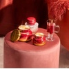 image:imageCapri Blue Scented Candles  Glimmer Collection  Ombre Glass Candle Holder  Luxury Apple Candles for Women amp Men  Signature Jar in Cranberry Red and Gold Apple Cider Social 19 ozApple Cider Social